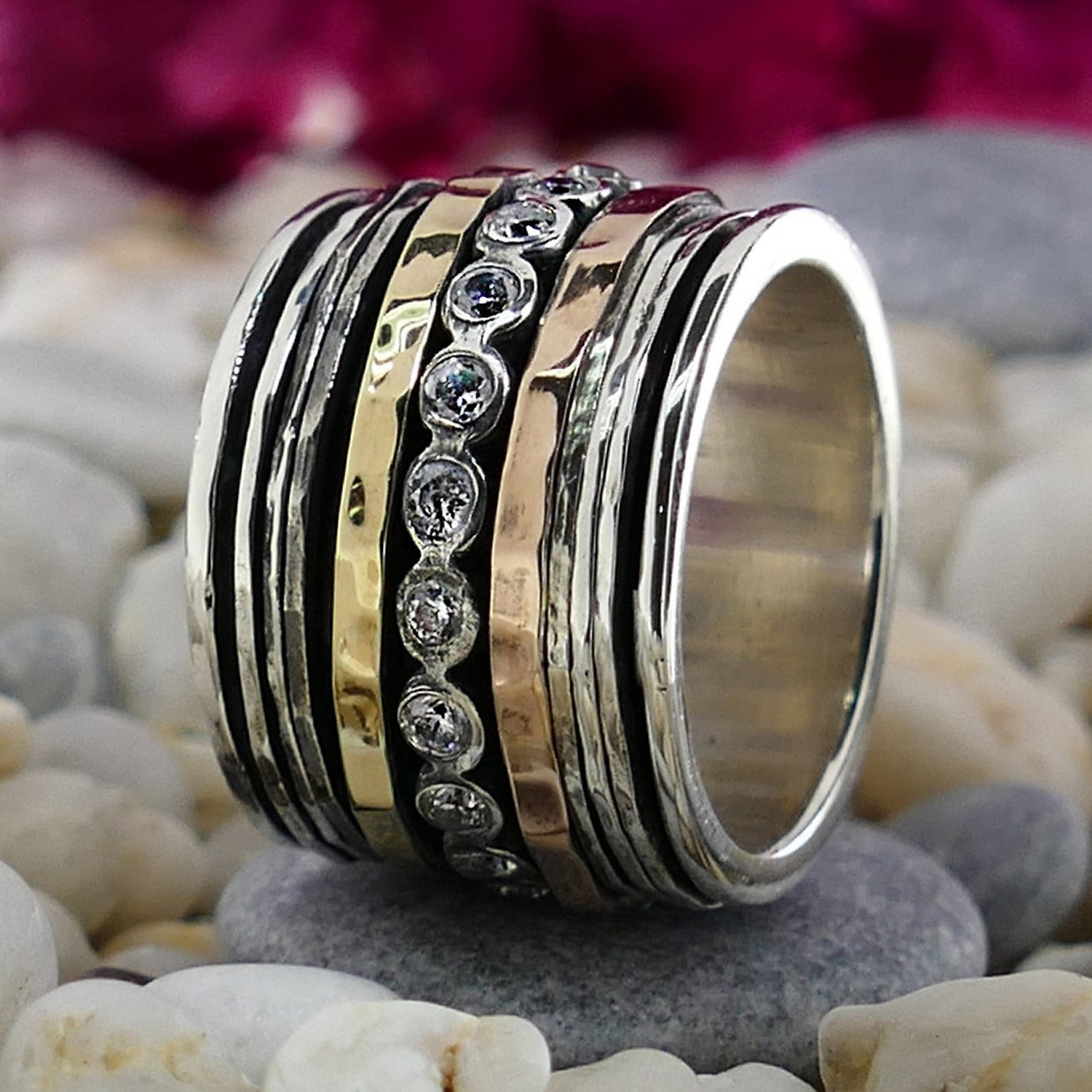 White Cubic Zirconia Stone Two Tone Solid 9k Yellow & Rose Gold 925 Sterling Silver Spinner Ring Total Carat Weight: 1.50 - 1.74 Thickness mm: 3 Occasion: Anniversary Width mm: 17 Weight gr.: 17.3 Total Carat Weight (TCW): 1.6