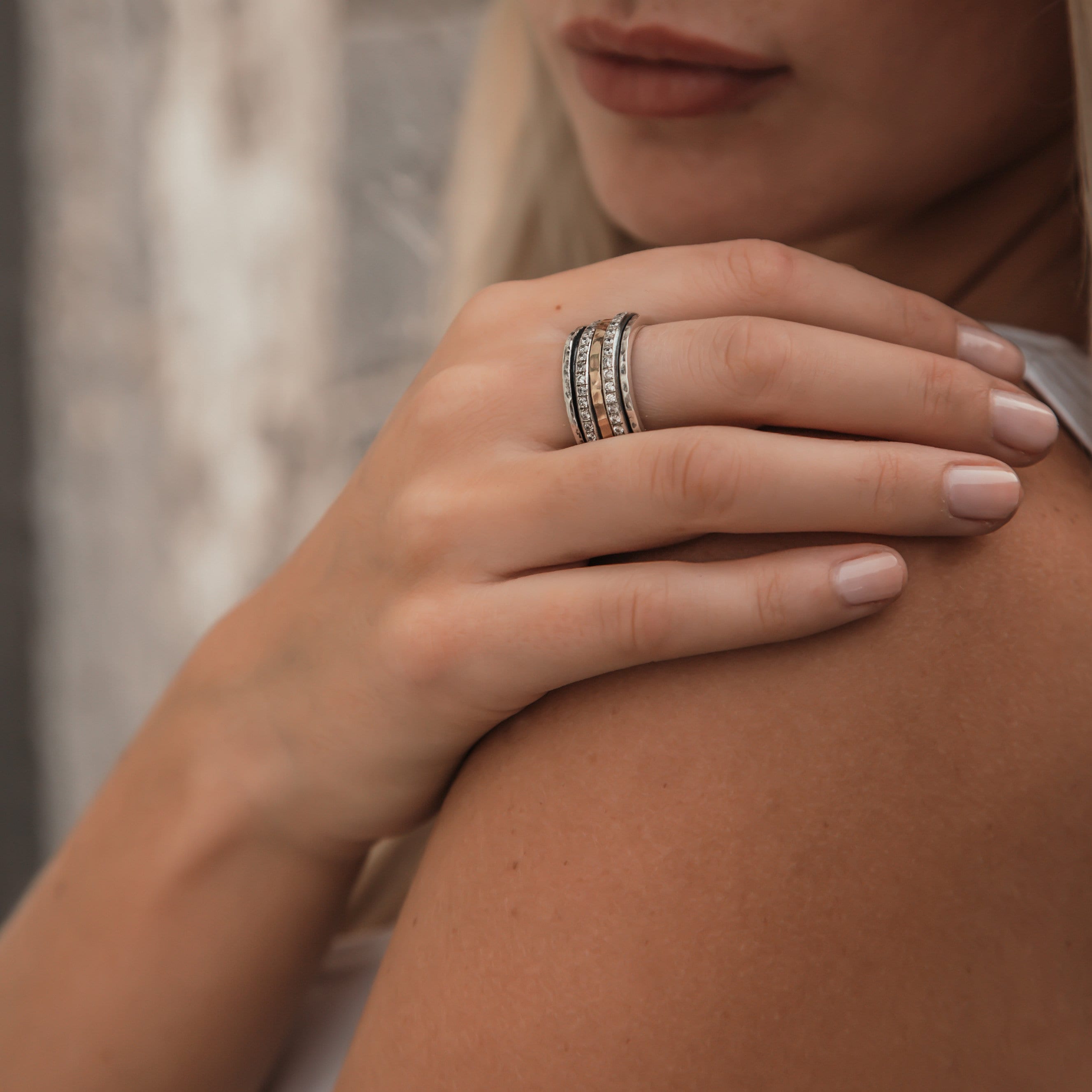Mesmerizing Designs: Unique Two Tone Silver Spinner Ring with Gold & Cubic Zirconia