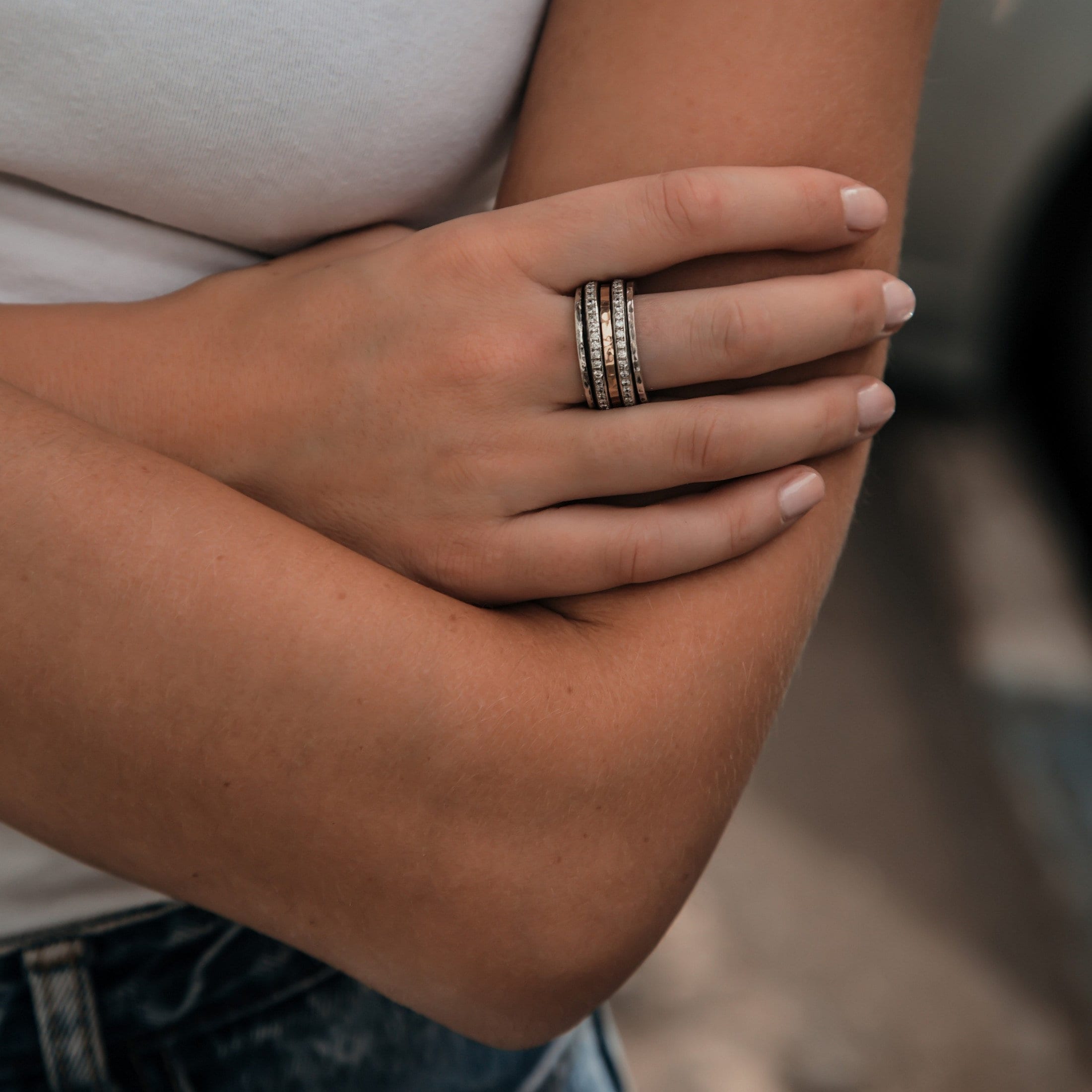 Mesmerizing Designs: Unique Two Tone Silver Spinner Ring with Gold & Cubic Zirconia