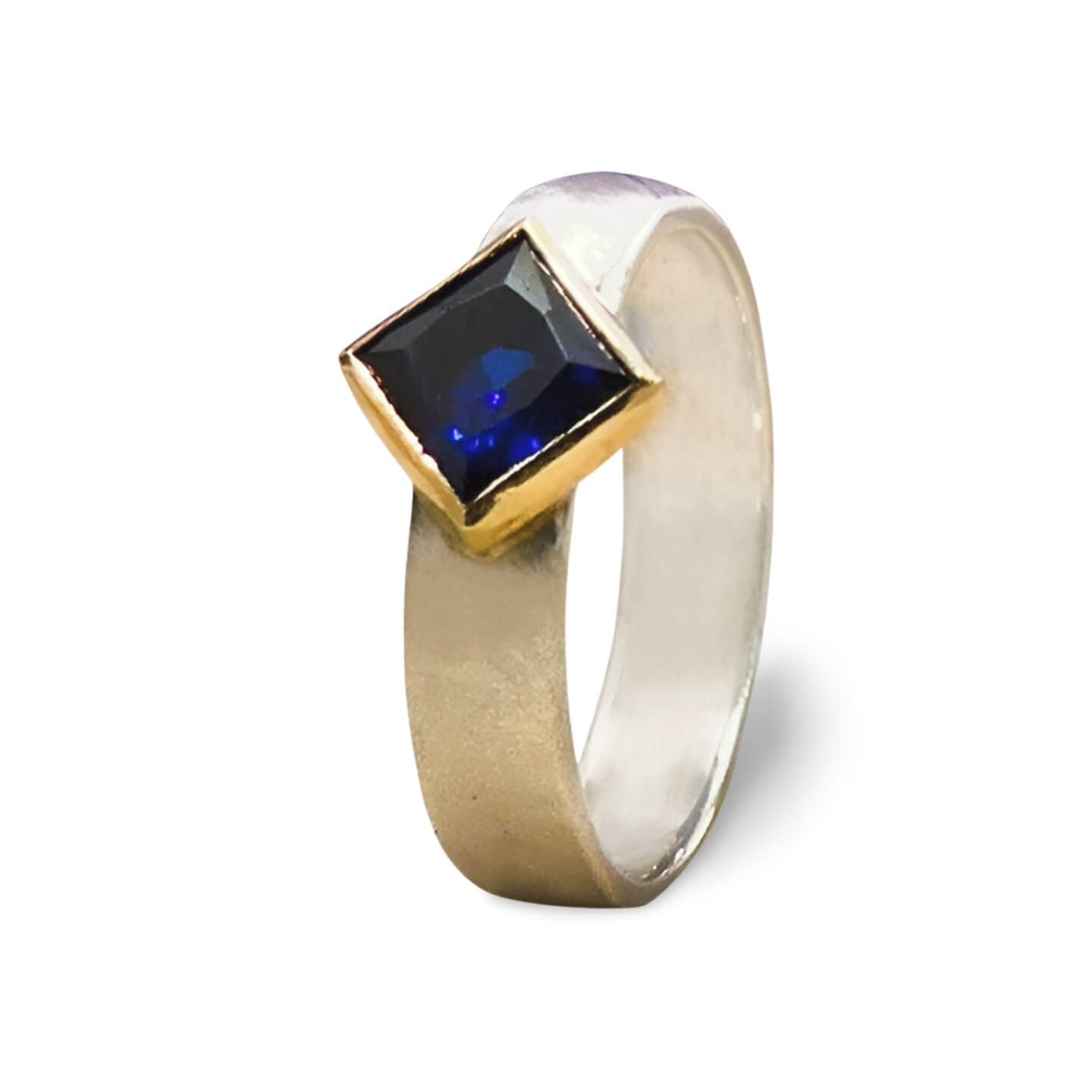 Spira Stunning 1.1 Carat Blue Sapphire Solitaire Ring in Two-Tone Gold & Silver