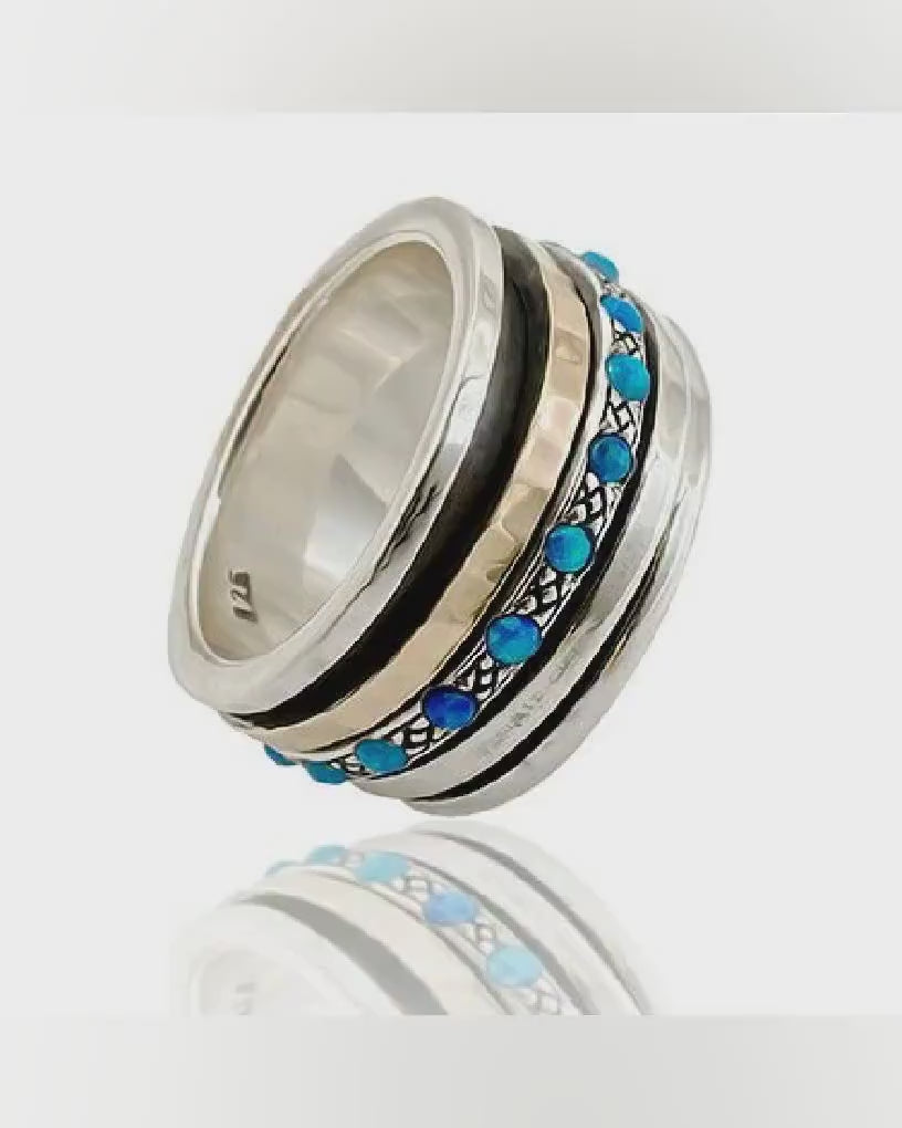 A Symphony of Textures: Unique Silver and Gold Opal Spinner Rings that Engage Your Senses