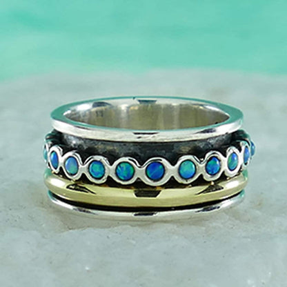 Opal Elegance: Contemporary Two-Tone Spinner Ring