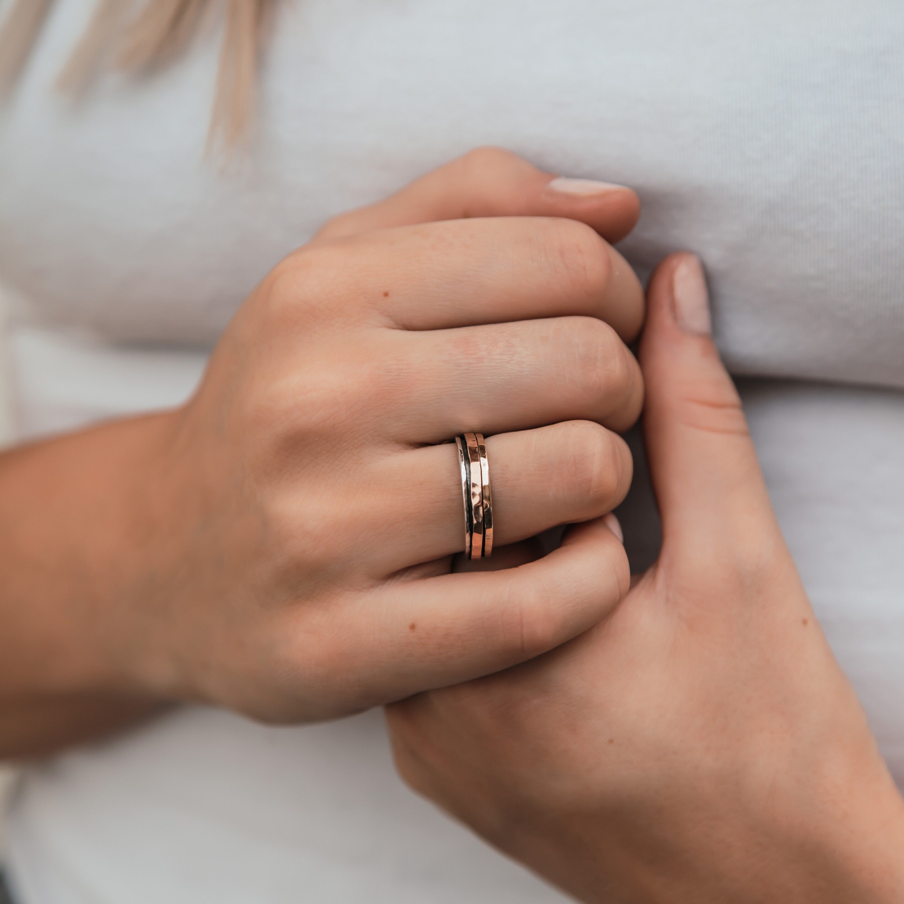 Timeless Whirlwind: Mixed Metal Silver and Gold Spinner Band