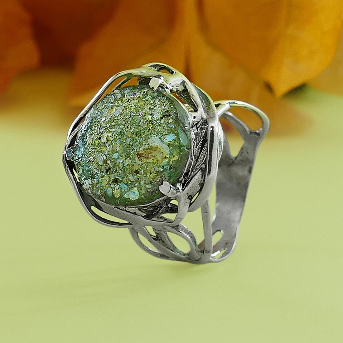 Green Roman Glass 925 Sterling Silver Solitaire Ring Front Width mm: 20 Back Width mm: 4 Metal Purity: 925 parts per 1000 Country/Region of Manufacture: Israel Main Stone: Roman Glass Thickness mm: 1 Hight Above The Finger mm: 10 Weight gr.: 6.5