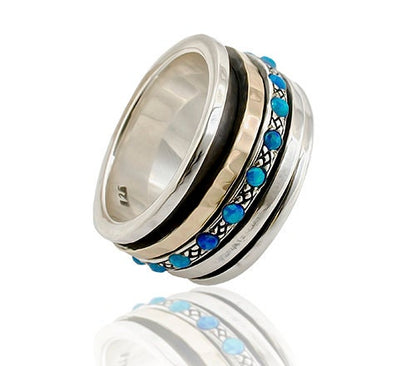 Blue Opal Stone Two Tone Solid 9k Yellow Gold &amp; 925 Sterling Silver Spinner Ring Metal Purity: 9k Spinner rings quantity: 3 Main Stone: Doublet Opals Total Carat Weight (TCW): 0.6 Thickness mm: 3 Width mm: 11.5 Weight gr.: 13.2