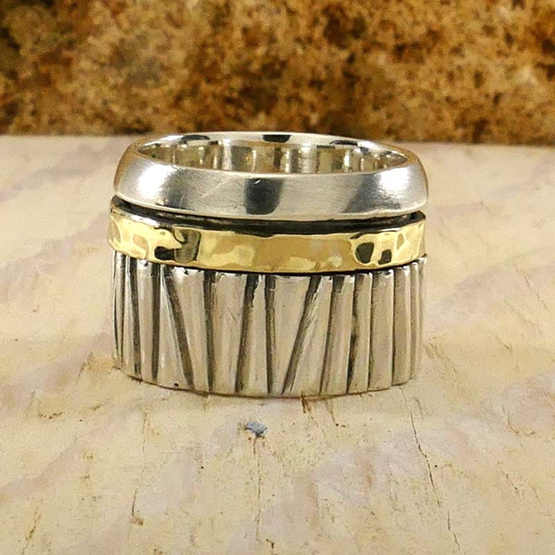 Mesmerizing Design: Unique Silver and Gold Spinner Rings that Captivate the Eye