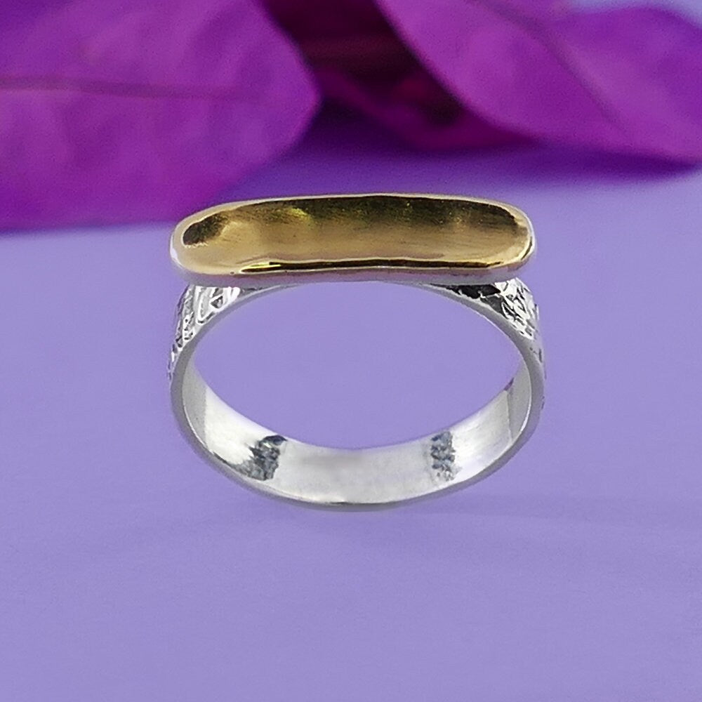 Chic Contrast: Artisan Two-Tone Stunner Ring