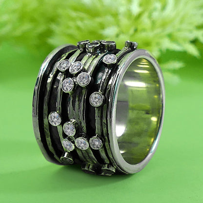Handcrafted Harmony: Unique Sterling Silver Spinner Rings CZ setting for the Discerning Individual
