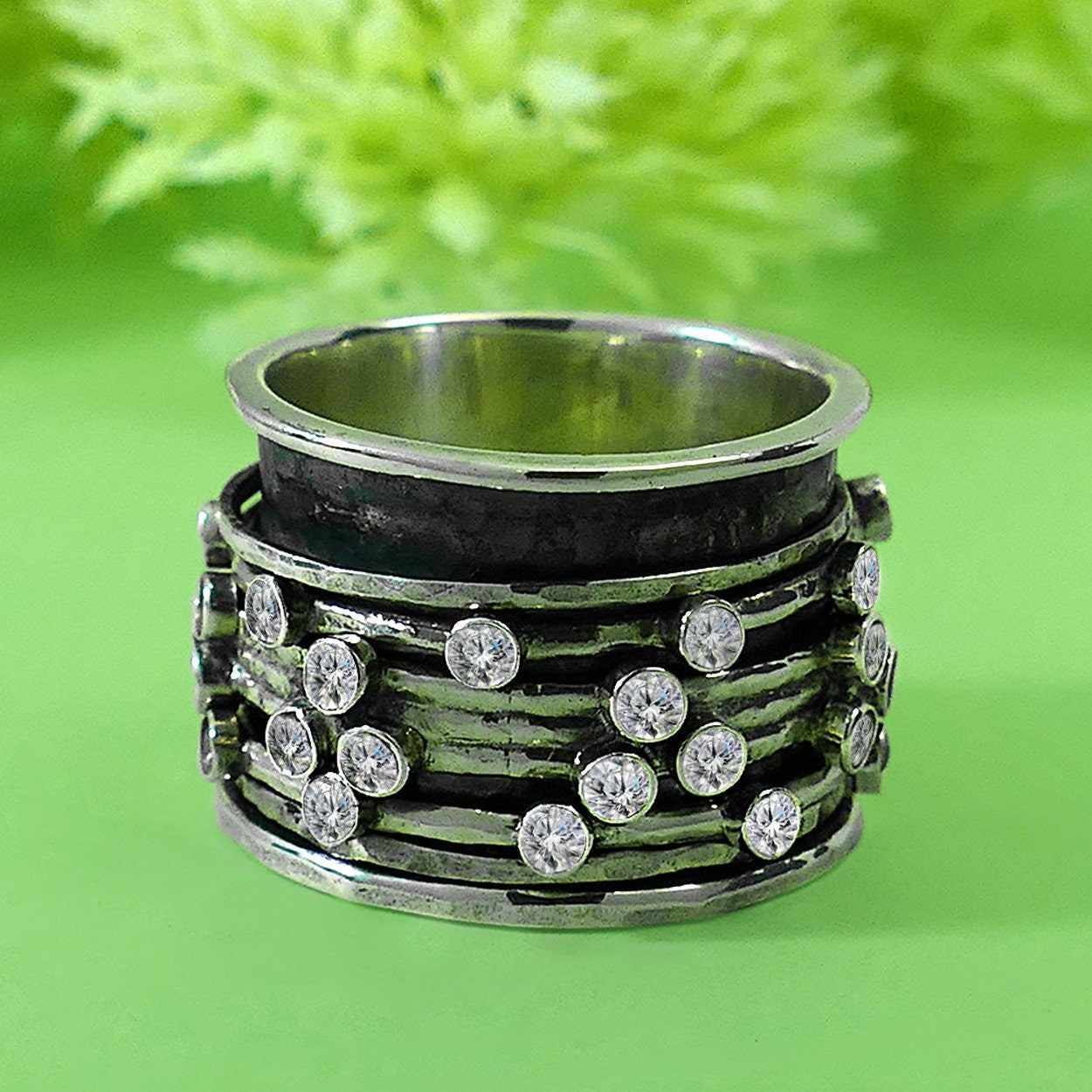 Handcrafted Harmony: Unique Sterling Silver Spinner Rings CZ setting for the Discerning Individual