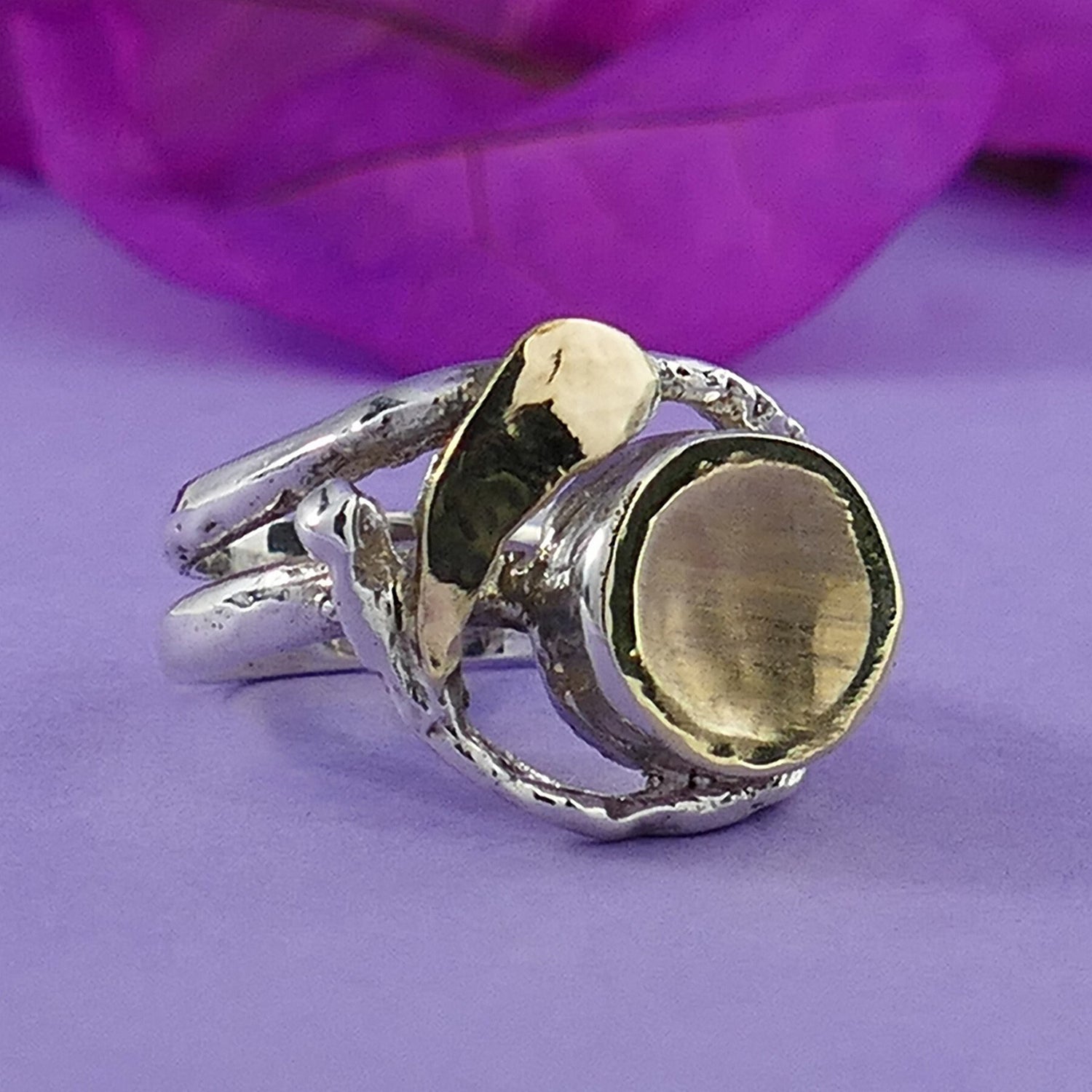 A Symphony of Metals: Silver and Gold Statement Ring