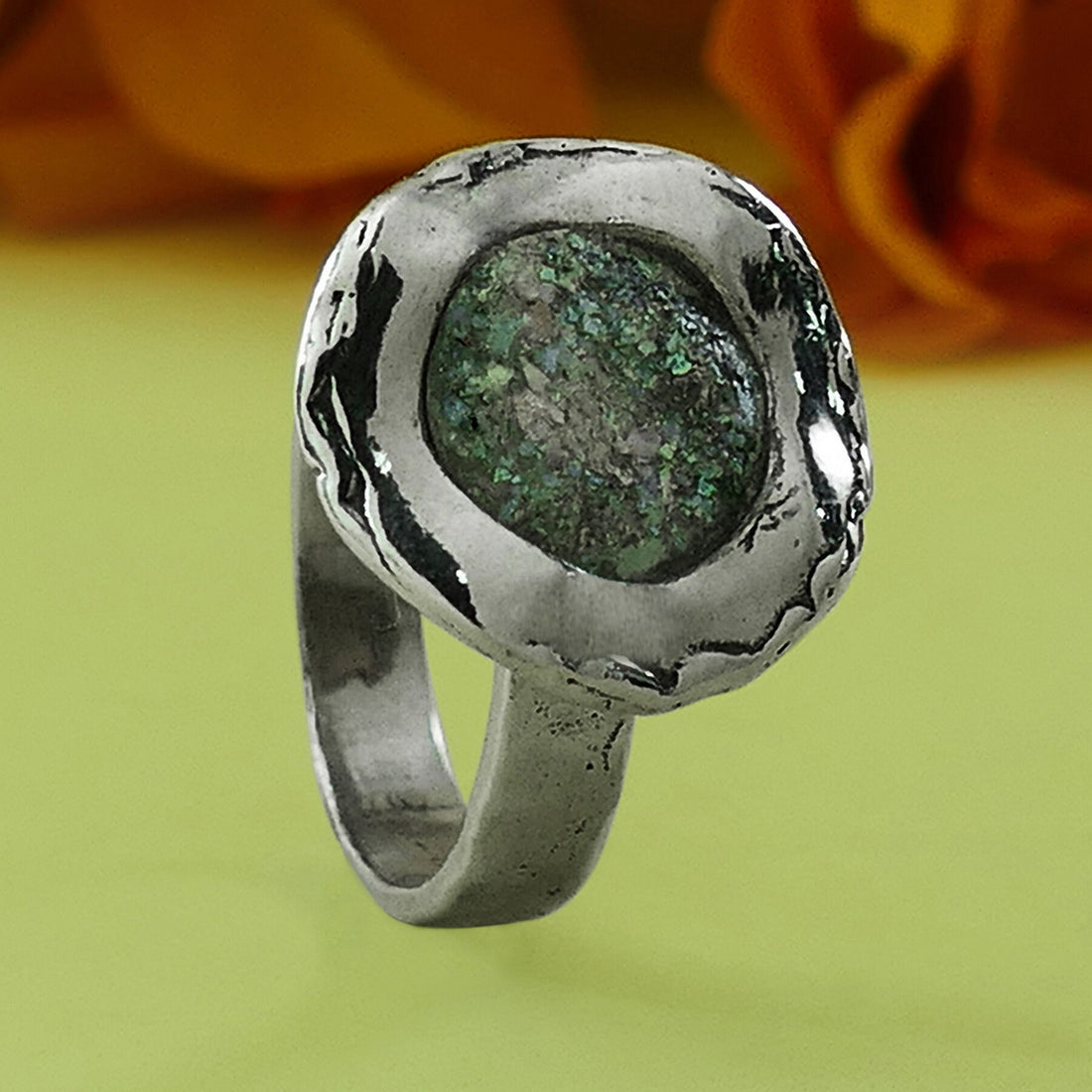 Green Roman Glass 925 Sterling Silver Solitaire Ring Country/Region of Manufacture: Israel Metal Purity: 925 parts per 1000 Main Stone: Roman Glass Front Width mm: 17 Back Width mm: 4 Thickness mm: 1 Hight Above The Finger mm: 5 Weight gr.: 5.8