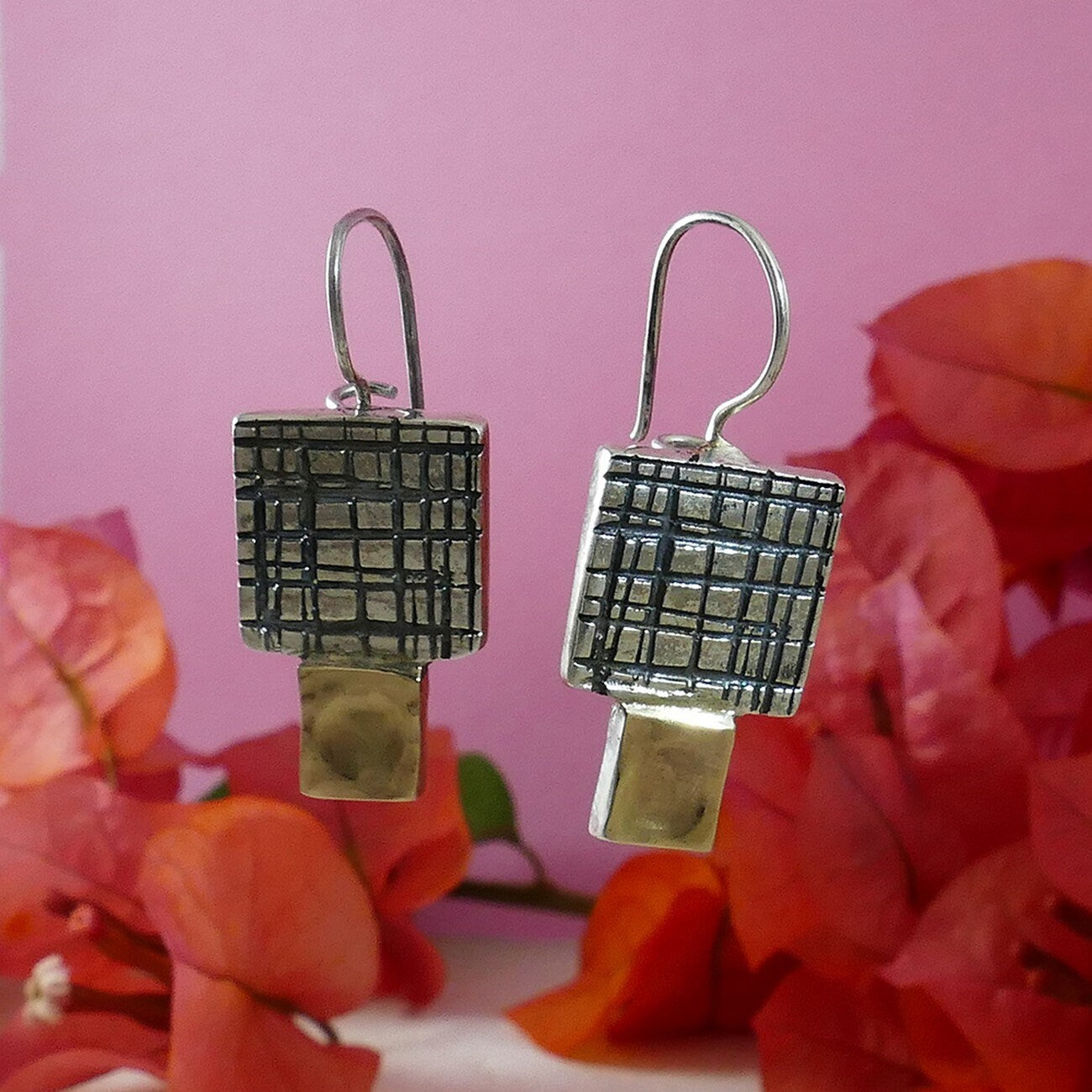 Chic Fusion: Handcrafted Silver and Gold Dangle Earrings