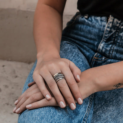 Dynamic Duo: Artisan Two-Tone Spin Ring Design