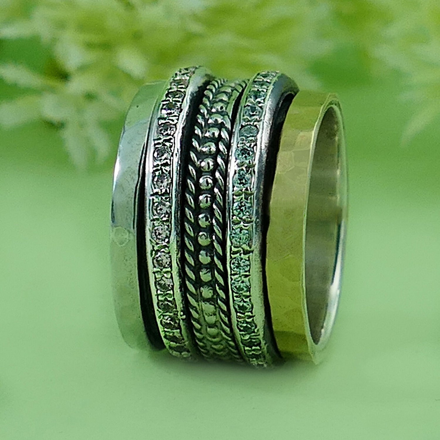 Dynamic Duo: Artisan Two-Tone Spin Ring Design