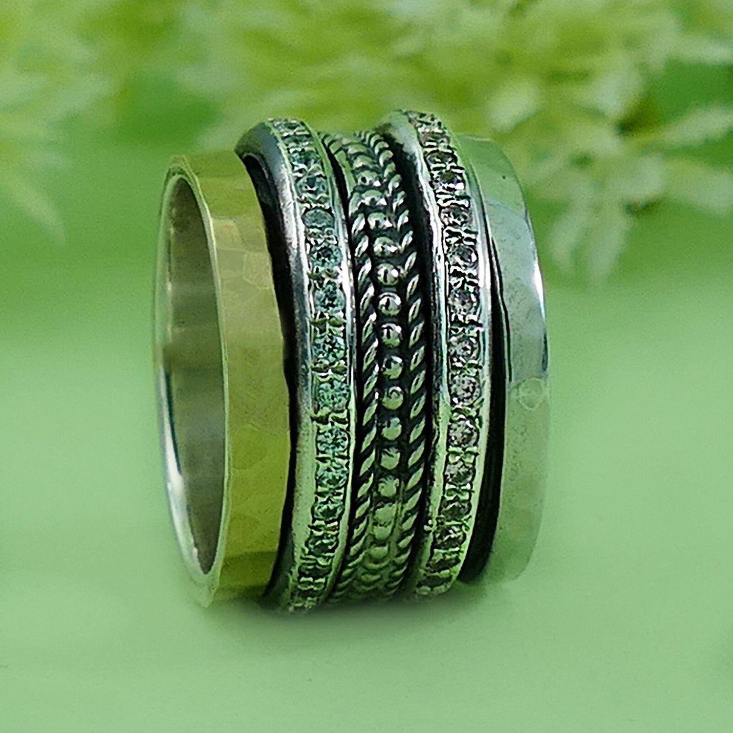 Dynamic Duo: Artisan Two-Tone Spin Ring Design