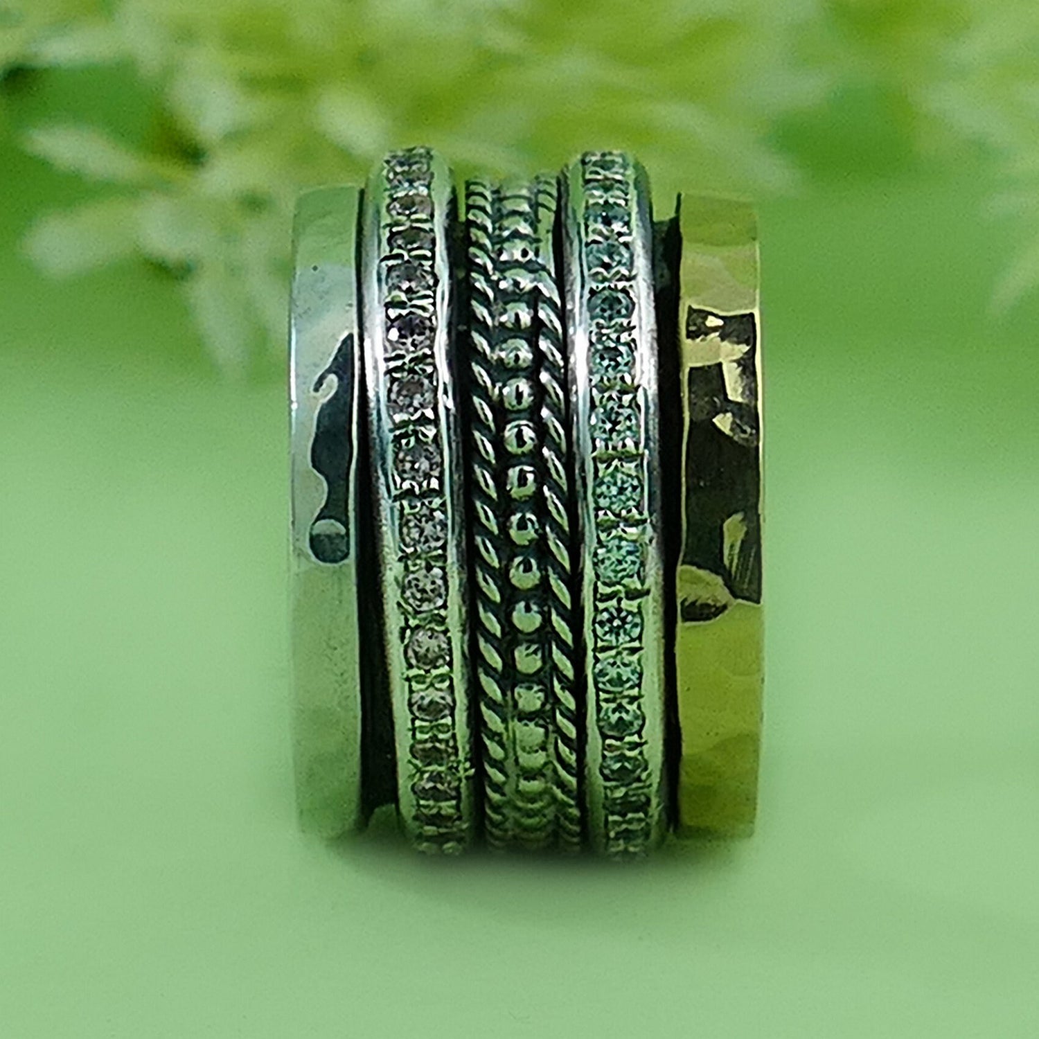 Dynamic Duo: Artisan Two-Tone Spin Ring Design