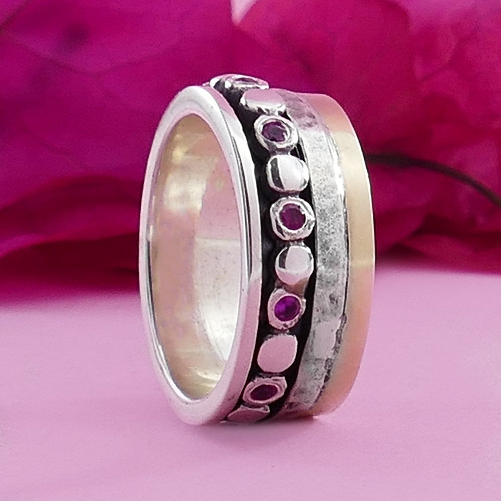 Natural Red Ruby Gemstone Two Tone Solid 9k Yellow Gold &amp; 925 Sterling Silver Spinner Ring Main Stone: Ruby Main Stone Creation: Natural Total Carat Weight (TCW): 0.8 Thickness mm: 2.5 Hight Above The Finger mm: 2.5 Width mm: 9 Weight gr.: 8.1