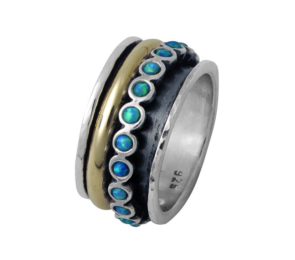 0.6 Carat Blue Opal Stone Two Tone Solid 9k Yellow Gold &amp; 925 Sterling Silver Spinner Ring Metal Purity: 9k Main Stone: Doublet Opals Total Carat Weight (TCW): 0.6 Thickness mm: 2 Hight Above The Finger mm: 2 Width mm: 10.5 Weight gr.: 8.6