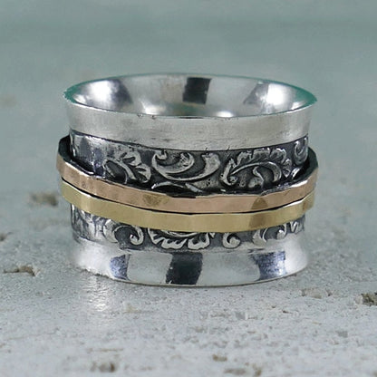 A Symphony of Textures: Unique Silver and Gold Spinner Rings that Engage Your Senses