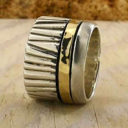 Mesmerizing Design: Unique Silver and Gold Spinner Rings that Captivate the Eye