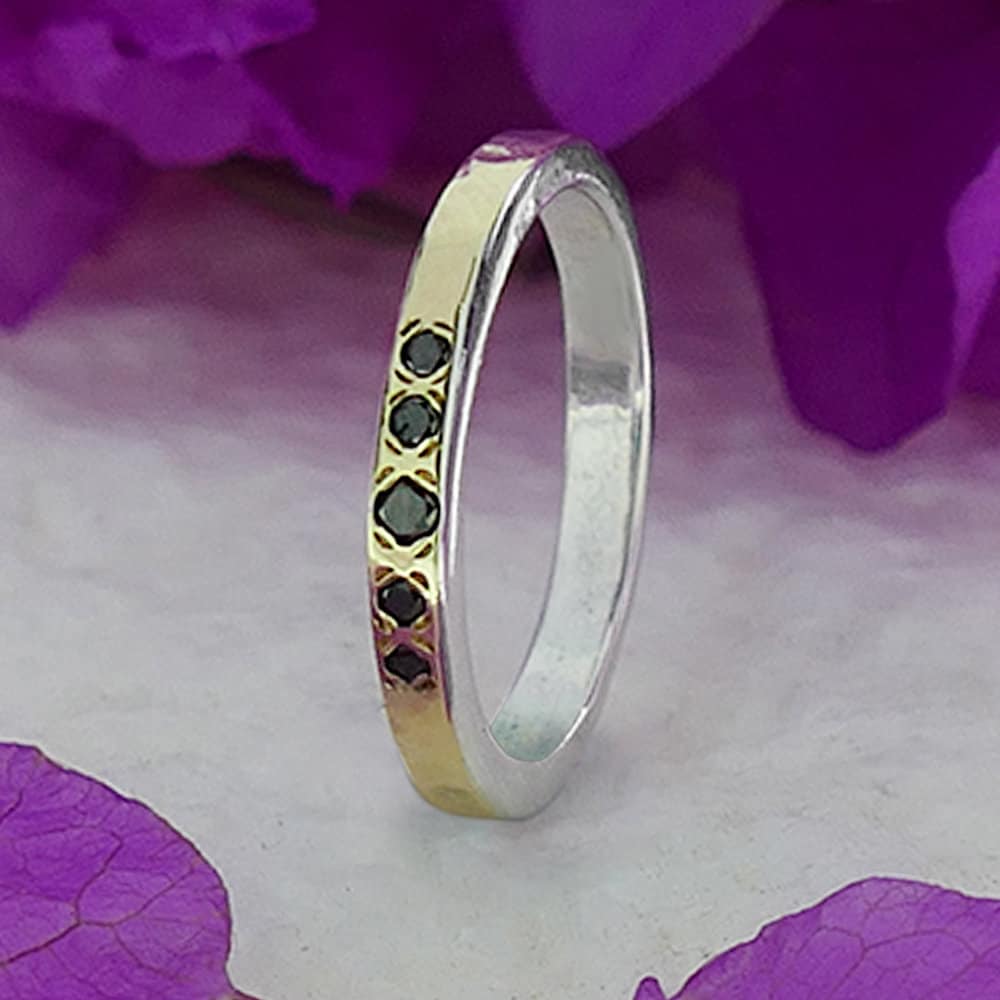 Black Diamonds Two Tone Solid 9k Yellow Gold &amp; 925 Sterling Silver Stackable Ring Thickness mm: 2 Hight Above The Finger mm: 2 Width mm: 3 Weight gr.: 2.9 Main Stone: Diamond Main Stone Creation: Natural Total Carat Weight (TCW): 0.2