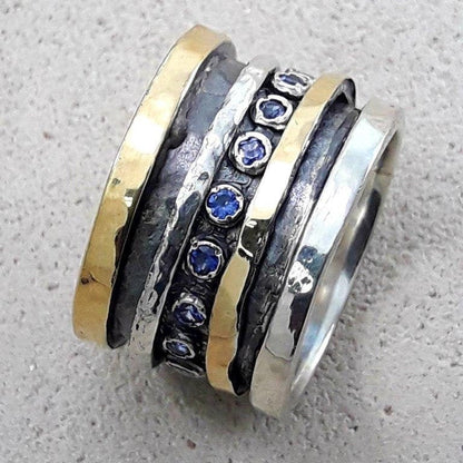 Where Style and Meaning Intertwine: Unique Silver and Gold Spinner Rings that Speak Volumes