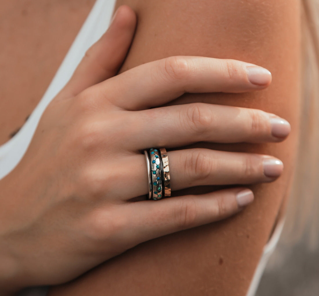 Where Style and Meaning Intertwine: Unique Blue Opal Silver and Gold Spinner Ring that Speak Volumes