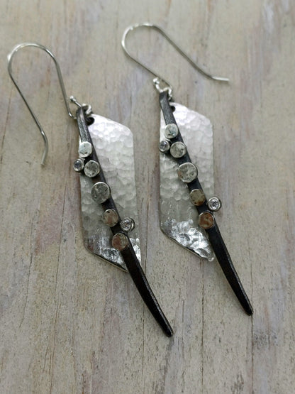 Sterling Radiance: Handcrafted Silver Statement Earrings