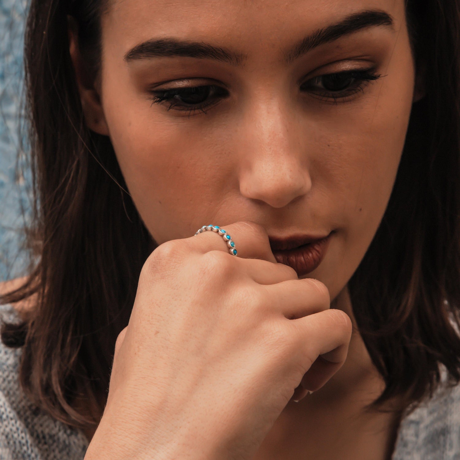 Timeless Opulence: Sterling Silver Eternity Opals Ring