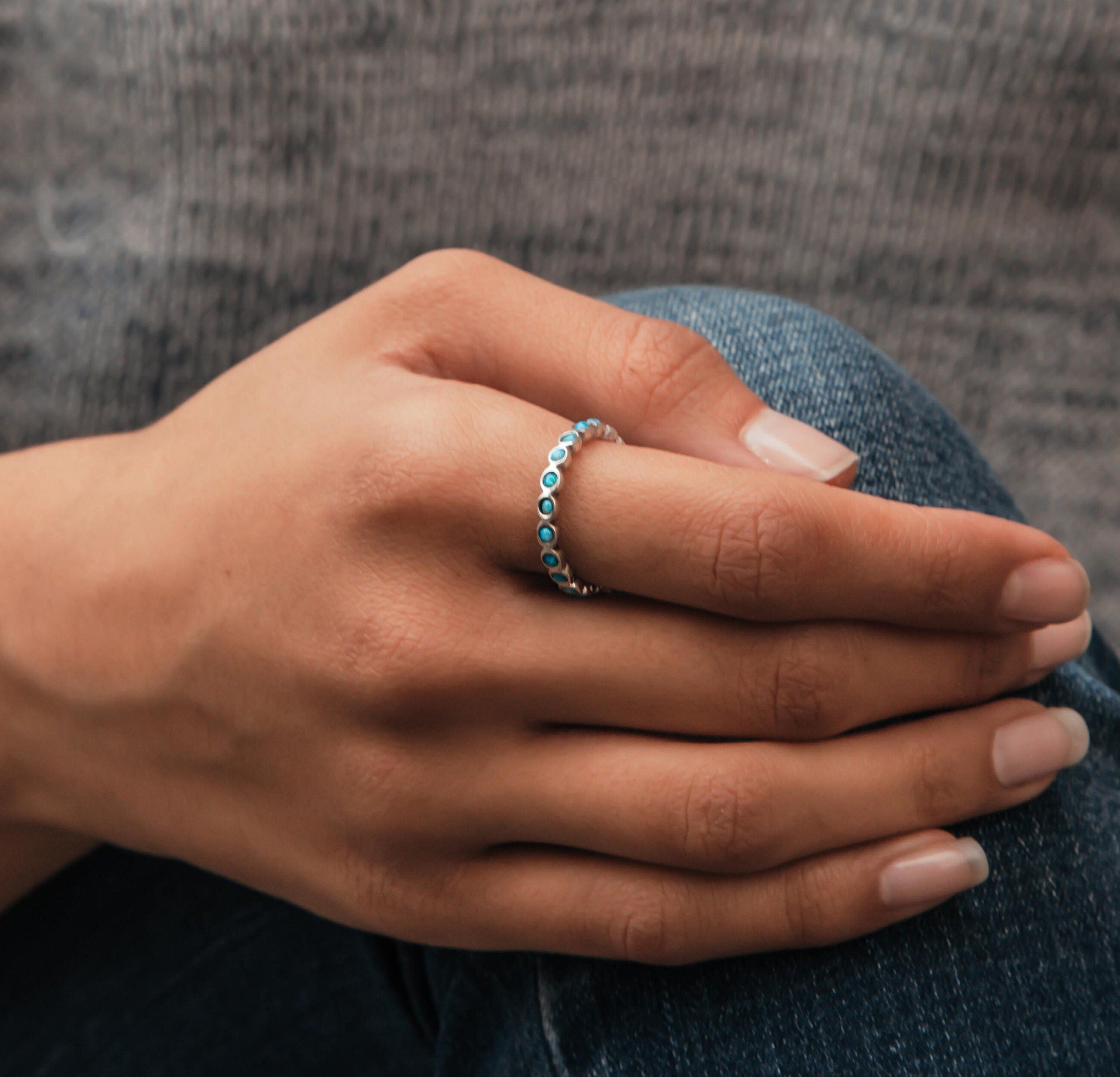 Timeless Opulence: Sterling Silver Eternity Opals Ring